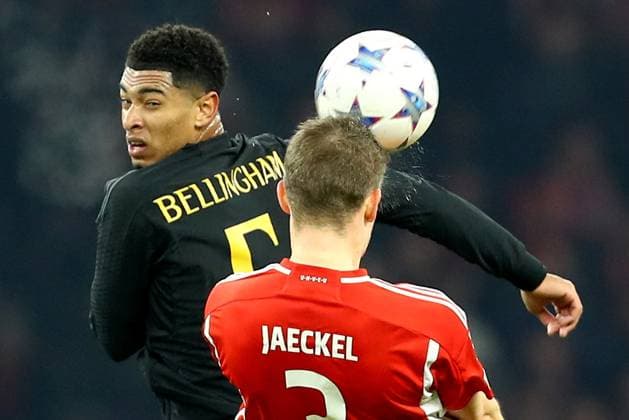 12.12.2023, xtgx, Fussball UEFA Champions League, Union Berlin - Real Madrid emspor, v.l. Jude Bellingham (Real Madrid) Paul Jaeckel (1. FC Union Berlin) Zweikampf, Aktion, action, battle for the ball (DFL DFB REGULATIONS PROHIBIT ANY USE OF PHOTOGRAPHS as IMAGE SEQUENCES and or QUASI-VIDEO) Berlin