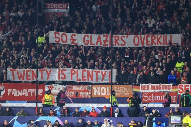 Football - UEFA Champions League - Group A - Manchester United, ManU v Bayern Munich 12th December 2023 - UEFA Champions League - Group A - Manchester United v Bayern Munich - Manchester United fans hold up banners protesting the Glaziers - Photo: Simon Stacpoole Offside. Manchester UK Copyright: xSimonxStacpoolexOffside