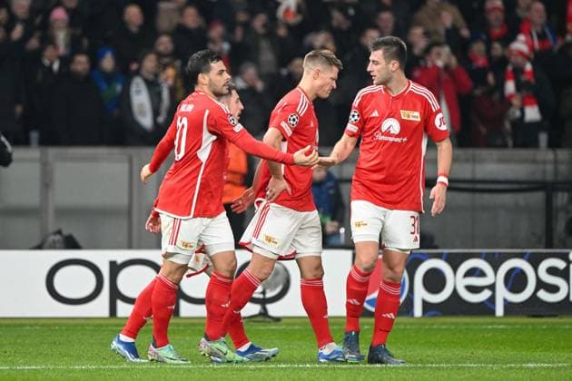 Fussball, Herren, Saison 2023 2024, UEFA Champions League (Gruppe C, 6. Spieltag), 1. FC Union Berlin - Real Madrid, v.l. Kevin Volland (1. FC Union Berlin) und Robin Knoche (1. FC Union Berlin) Torjubel, jubelt nach dem Tor zum 1:0 , 12.12. 2023, Copyright: xMatthiasxKochx