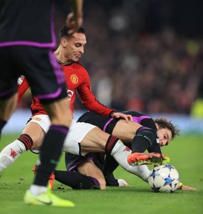 Football - UEFA Champions League - Group A - Manchester United, ManU v Bayern Munich 12th December 2023 - UEFA Champions League - Group A - Manchester United v Bayern Munich - Antony of Manchester United tackles Leon Goretzka of Bayern Munich - Photo: Simon Stacpoole Offside. Manchester UK Copyright: xSimonxStacpoolexOffside