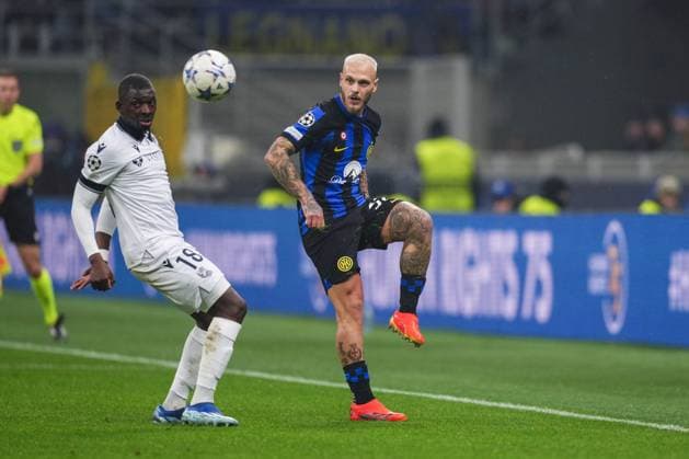MILAN, ITALY - DECEMBER 12: Federico Dimarco of Inter (R) against Hamari Traore of Real Sociedad (L) during the UEFA Champions League Group Stage match between FC Internazionale and Real Sociedad at Stadio Giuseppe Meazza on December 12, 2023 in Milan, Italy. Copyright: xJustPictures.ch JarixPestelaccix jp-en-EuSpIm-Inter_Sociedad_12Dec2023_JAR_00026