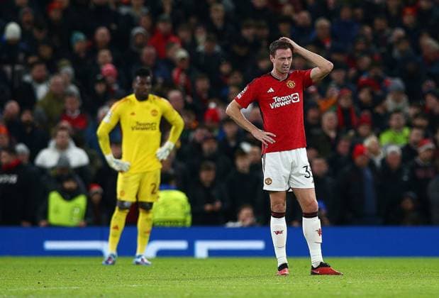 Jonny Evans of Manchester United, ManU looks dejected after conceding a goal Manchester United v Bayern Munich, UEFA Champions League, Group A, Football, Old Trafford, Manchester, UK - 12 Dec 2023 EDITORIAL USE ONLY No use with unauthorised audio, video, data, fixture lists, club league logos or live services. Online in-match use limited to 120 images, no video emulation. No use in betting, games or single club league player publications. Copyright: xMattxWest Shutterstockx 14254194bm