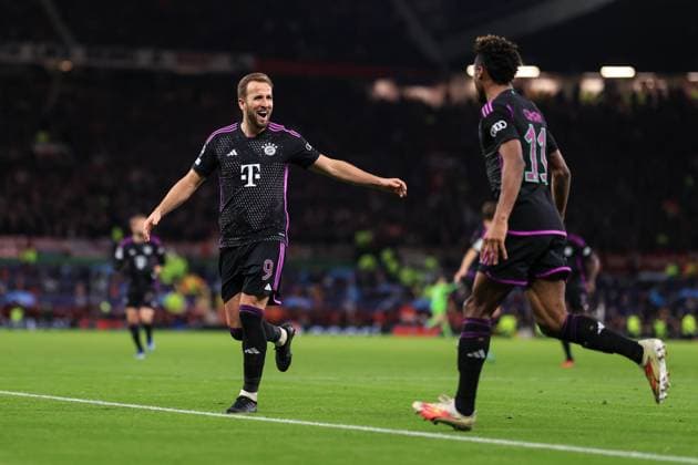Football - UEFA Champions League - Group A - Manchester United, ManU v Bayern Munich 12th December 2023 - UEFA Champions League - Group A - Manchester United v Bayern Munich - Harry Kane of Bayern Munich celebrates their first goal with goalscorer Kingsley Coman - Photo: Simon Stacpoole Offside. Manchester UK Copyright: xSimonxStacpoolexOffside