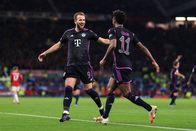 Football - UEFA Champions League - Group A - Manchester United, ManU v Bayern Munich 12th December 2023 - UEFA Champions League - Group A - Manchester United v Bayern Munich - Harry Kane of Bayern Munich celebrates their first goal with goalscorer Kingsley Coman - Photo: Simon Stacpoole Offside. Manchester UK Copyright: xSimonxStacpoolexOffside