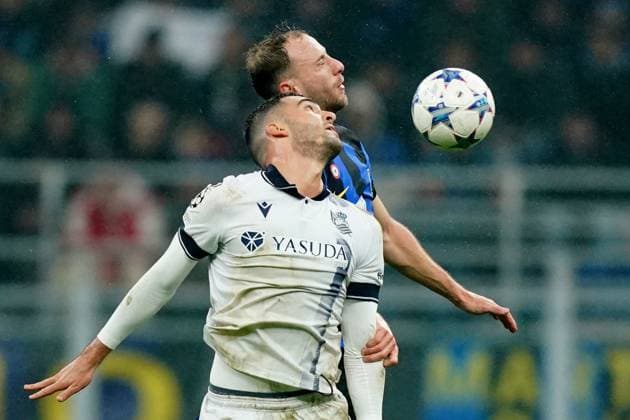 Foto Spada LaPresse 12 Dicembre 2023 - Milano , Italia - calcio - Inter vs Real Sociedad - Champions League 2023 2024 - Stadio San Siro. Nella foto: mikel merino (real ) Carlos Augusto (FC Inter); December 12 , 2023 Milan , Italy - sport, calcio - Inter vs Real Sociedad Champions League 2023 2024 - San Siro Stadium . In the pic : mikel merino (real ) Carlos Augusto (FC Inter);  Copyright: xSpada LaPressex