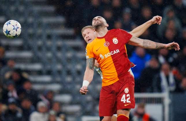 FCK s Andreas Cornelius and Galatasaray s Abdulkerim Bardakci during the Champions League match between FC Copenhagen - Galatasaray SK in Parken, Tuesday 12 December 2023. (Photo: Liselotte Sabroe Ritzau Scanpix) , Copenhagen Denmark