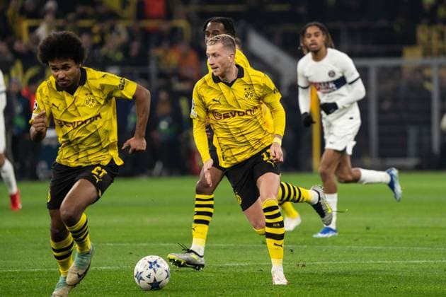 GER, Champions League, Borussia Dortmund vs Paris Saint-Germain 13.12.2023, Signal Iduna Park, Dortmund, GER, Champions League, Borussia Dortmund vs Paris Saint-Germain Im Bild: Marco Reus (BV Borussia Dortmund, 11) Einzelaktion; Ganzkörper Ganzkoerper ; Ball am Fuss;