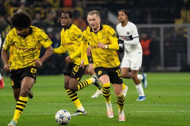 GER, Champions League, Borussia Dortmund vs Paris Saint-Germain 13.12.2023, Signal Iduna Park, Dortmund, GER, Champions League, Borussia Dortmund vs Paris Saint-Germain Im Bild: Marco Reus (BV Borussia Dortmund, 11) Einzelaktion; Ganzkörper Ganzkoerper ; Ball am Fuss;