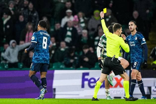 UEFA Champions League: Celtic v Feyenoord Glasgow - Quinten Timber of Feyenoord, Referee Benoit Bastien during the 6th leg of the UEFA Champions League group stage between Celtic v Feyenoord at Celtic Park on 13 December 2023 in Glasgow, Scotland. Copyright: xTomxBodex