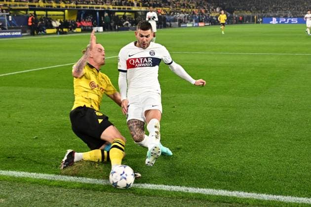 13.12.2023, xsltx, Fussball UEFA Champions League, Borussia Dortmund - Paris St.Germain PSG emspor, v.l. Marius Wolf (Borussia Dortmund) Lucas Hernandez (FC Paris Saint-Germain) Zweikampf, Aktion, action, battle for the ball (DFL DFB REGULATIONS PROHIBIT ANY USE OF PHOTOGRAPHS as IMAGE SEQUENCES and or QUASI-VIDEO) Dortmund