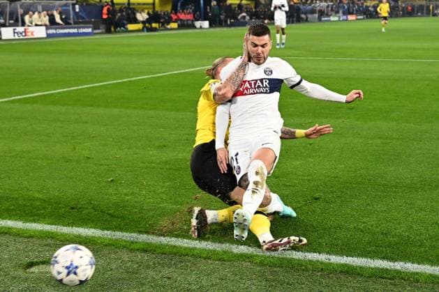 13.12.2023, xsltx, Fussball UEFA Champions League, Borussia Dortmund - Paris St.Germain PSG emspor, v.l. Marius Wolf (Borussia Dortmund) Lucas Hernandez (FC Paris Saint-Germain) Zweikampf, Aktion, action, battle for the ball (DFL DFB REGULATIONS PROHIBIT ANY USE OF PHOTOGRAPHS as IMAGE SEQUENCES and or QUASI-VIDEO) Dortmund