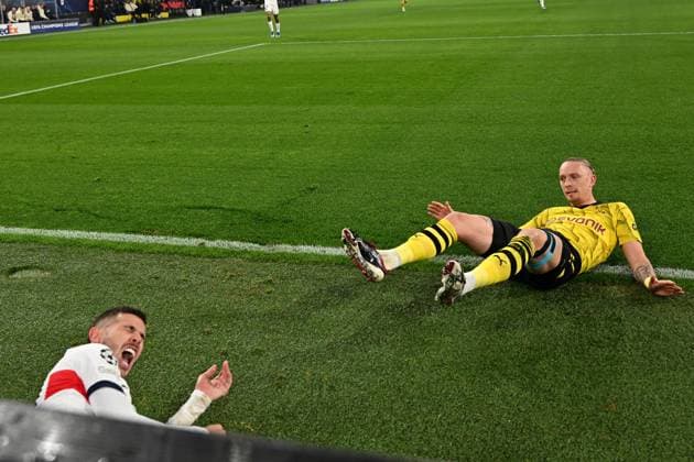 13.12.2023, xsltx, Fussball UEFA Champions League, Borussia Dortmund - Paris St.Germain PSG emspor, v.l. Marius Wolf (Borussia Dortmund) Lucas Hernandez (FC Paris Saint-Germain) Zweikampf, Aktion, action, battle for the ball (DFL DFB REGULATIONS PROHIBIT ANY USE OF PHOTOGRAPHS as IMAGE SEQUENCES and or QUASI-VIDEO) Dortmund