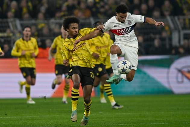 v. li. im Zweikampf Karim Adeyemi ( 27, Borussia Dortmund) Warren Zaire-Emery ( 33, Paris Saint-Germain) 13.12.2023 Fussball, Champions League, Borussia Dortmund vs Paris St. Germain, Signal Iduna Park, Dortmund, NRW Germany