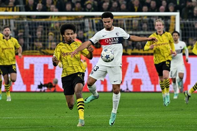 13.12.2023, xsltx, Fussball UEFA Champions League, Borussia Dortmund - Paris St.Germain PSG emspor, v.l. Karim Adeyemi (Borussia Dortmund) Waren Zaire-Emery (FC Paris Saint-Germain) Zweikampf, Aktion, action, battle for the ball (DFL DFB REGULATIONS PROHIBIT ANY USE OF PHOTOGRAPHS as IMAGE SEQUENCES and or QUASI-VIDEO) Dortmund