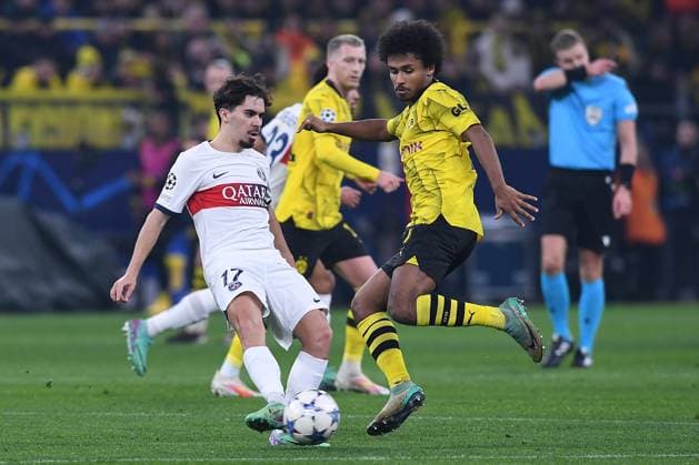 Fußball Champions League Gruppenphase 6. Spieltag Borussia Dortmund - Paris Saint-Germain am 13.12.2023 im Signal Iduna Park in Dortmund Vitinha ( Paris ), links - Karim Adeyemi ( Dortmund ), rechts