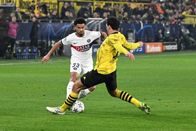 13.12.2023, xsltx, Fussball UEFA Champions League, Borussia Dortmund - Paris St.Germain PSG emspor, v.l. Waren Zaire-Emery (FC Paris Saint-Germain) Mats Hummels (Borussia Dortmund) Foul Zweikampf, Aktion, action, battle for the ball (DFL DFB REGULATIONS PROHIBIT ANY USE OF PHOTOGRAPHS as IMAGE SEQUENCES and or QUASI-VIDEO) Dortmund
