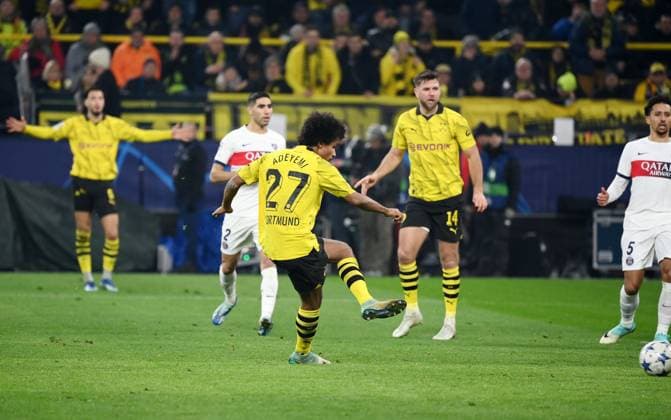 Niclas Füllkrug (Borussia Dortmund), mi., spielt auf Karim Adeyemi (Borussia Dortmund), li., der das Tor zum 1:0 erzielt 13.12.2023, Fussball Champions League, Saison 2023 2024, Vorrunde, 6. Spieltag, Borussia Dortmund - Paris Saint Germain Dortmund Signal Iduna Park Nordrhein Westfalen Deutschland