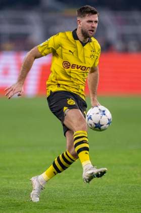 Fußball: Champions League. 6. Spieltag: Borussia Dortmund - Paris St. Germain am 13.12.2023 im Signal-Iduna-Park: Dortmunds Niclas Füllkrug läuft mit dem Ball am Fuß. WICHTIGER HINWEIS: Gemäß den Vorgaben der UEFA ist es untersagt, in dem Stadion und oder vom Spiel angefertigte Fotoaufnahmen in Form von Sequenzbildern und oder videoähnlichen Fotostrecken zu verwerten bzw. verwerten zu lassen. Copyright: xKirchner DavidxInderliedx