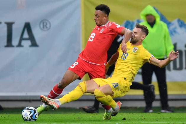 Romania V Switzerland - UEFA EURO, EM, Europameisterschaft,Fussball 2024 European Qualifiers Dan Ndoye and Denis Dragus in action during the UEFA EURO 2024 European Qualifiers match between Romania and Switzerland at Arena Nationala in Bucharest, Romania, on November 21, 2023. Bucharest Romania  Copyright: xAlexxNicodimx originalFilename:nicodim-romaniav231121_npWHD.jpg