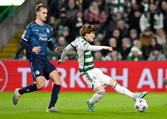 Glasgow, Scotland, 13th December 2023. Thomas Beelen of Feyenoord and Kyogo Furuhashi of Celtic during the UEFA Champions League match at Celtic Park, Glasgow. Picture credit should read: Neil Hanna Sportimage EDITORIAL USE ONLY. No use with unauthorised audio, video, data, fixture lists, club league logos or live services. Online in-match use limited to 120 images, no video emulation. No use in betting, games or single club league player publications. SPI-2799-0118