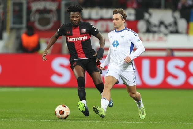 Germany, Leverkusen, 14.12.2023, BayArena, Bayer Leverkusen vs Molde FK - UEFA Europa League 2023 2024 - Group H, Edmond Tapsoba (Bayer 04 Leverkusen) und Fredrik Gulbrandsen (Molde FK) battle for the ball Leverkusen BayArena North Rhine-Westfalia Germany