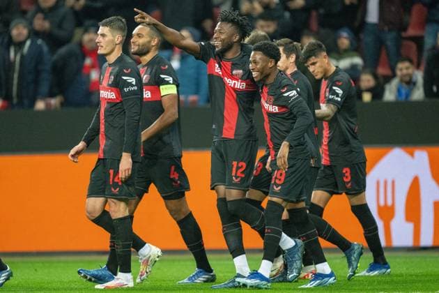 GER, EL, Bayer 04 Leverkusen vs Molde FK, Saison 2023 24, 14.12.2023, BayArena, Leverkusen, GER, EL, Bayer 04 Leverkusen vs Molde FK, Saison 2023 24, Im Billd: Jubel nach dem Tor zum 2 : 0 ;Torjubel Jubel; jubelt; jubeln; durch Edmond Tapsoba (Bayer 04 Leverkusen, 12) Einzelaktion, Halbkörper Halbkoerper; Freisteller, Einzelbild, Aktion, Action, Spielszene; Gestik, Mimik, Emotionen;