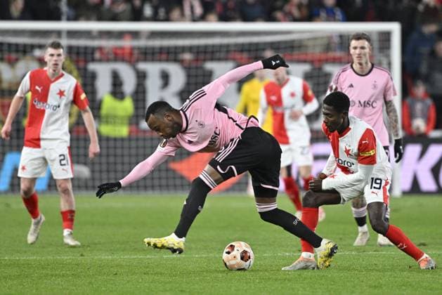 Gael Ondoua of Servette, left, and Oscar Dorley of Slavia in action during the UEFA Europa League 6th round Group G football match Slavia Praha vs Servette Geneva in Prague, Czech Republic, December 14, 2023. (CTKxPhoto VitxSimanek) CTKPhotoP2023121407631  CTKPhotoP2023121407631