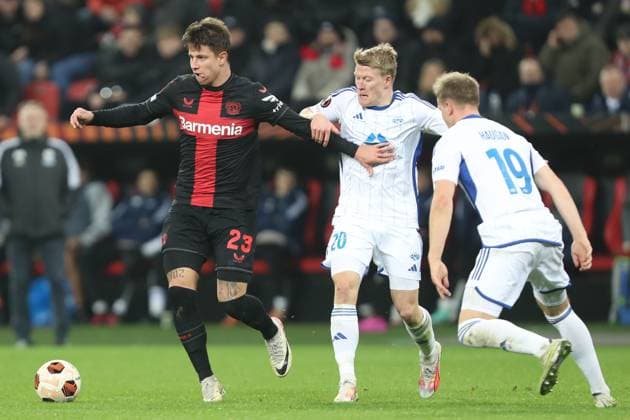 Germany, Leverkusen, 14.12.2023, BayArena, Bayer Leverkusen vs Molde FK - UEFA Europa League 2023 2024 - Group H, Adam Hlozek (Bayer 04 Leverkusen) und Kristian Eriksen (Molde FK) battle for the ball Leverkusen BayArena North Rhine-Westfalia Germany
