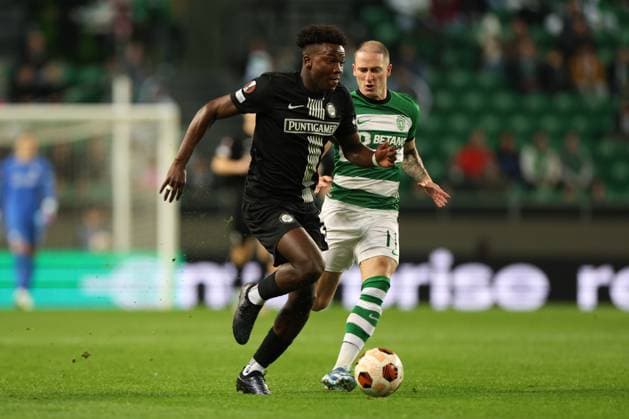 SOCCER - UEFA EL, Sporting vs Sturm LISBON,PORTUGAL,14.DEC.23 - SOCCER - UEFA Europa League, group stage, Sporting CP vs SK Sturm Graz. Image shows Seedy Jatta (Sturm) and Nuno Santos (Sporting Lissabon).  GEPAxpictures xChrisxBauer
