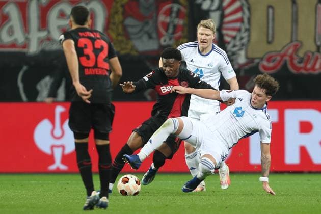 Germany, Leverkusen, 14.12.2023, BayArena, Bayer Leverkusen vs Molde FK - UEFA Europa League 2023 2024 - Group H, Nathan Tella (Bayer 04 (Bayer 04 Leverkusen) und Mathias Fjortoft Lovik (Molde FK) battle for the ball Leverkusen BayArena North Rhine-Westfalia Germany