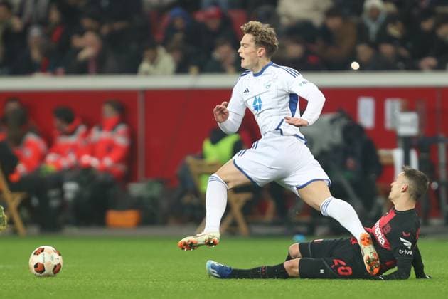 Germany, Leverkusen, 14.12.2023, BayArena, Bayer Leverkusen vs Molde FK - UEFA Europa League 2023 2024 - Group H, Gustav Nyheim (Molde FK) und Alejandro Grimaldo (Bayer 04 Leverkusen) battle for the ball Leverkusen BayArena North Rhine-Westfalia Germany