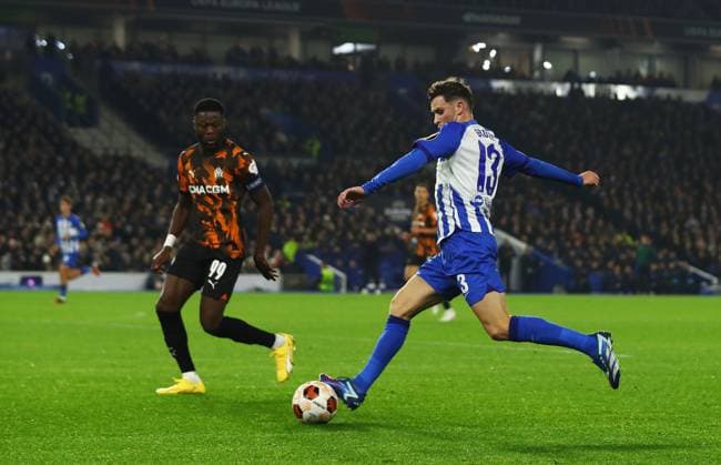 Brighton and Hove Albion v Olympique de Marseille, Brighton, UK - 14 Dec 2023 Pascal Gross of Brighton and Hove Albion is pressured by Chancel Mbemba of Olympique de Marseille during the Europa League match between Brighton and Hove Albion and Olympique de Marseille at The Amex Stadium, Brighton on 14 December 2023 ( Brighton The Amex Stadium Brighton England Copyright: xMicahxCrook PPAUKx PPA-075372