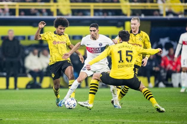 UEFA Champions League: Borussia Dortmund - FC Paris Saint-Germain; 13.12.2023 Zweikampf Karim Adeyemi (Borussia Dortmund, 27), Achraf Hakimi (FC Paris Saint-Germain, 2), Mats Hummels (Borussia Dortmund, 15) UEFA Champions League Spieltag 6: Borussia Dortmund - FC Paris Saint-Germain, Dortmund, SIGNAL IDUNA PARK am 13.12.2023 DFL REGULATIONS PROHIBIT ANY USE OF PHOTOGRAPHS AS IMAGE SEQUENCES AND OR QUASI-VIDEO. Copyright: xBEAUTIFULxSPORTS Wunderlx