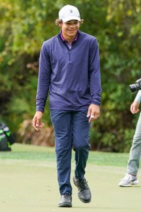 December 15, 2023, Orlando, Florida, USA: Charlie Woods walks off the 9th green during the 2023 PNC Championship Pro-Am at Ritz-Carlton Golf Club. Orlando USA - ZUMAw109 20231215_fap_w109_017 Copyright: xDebbyxWongx