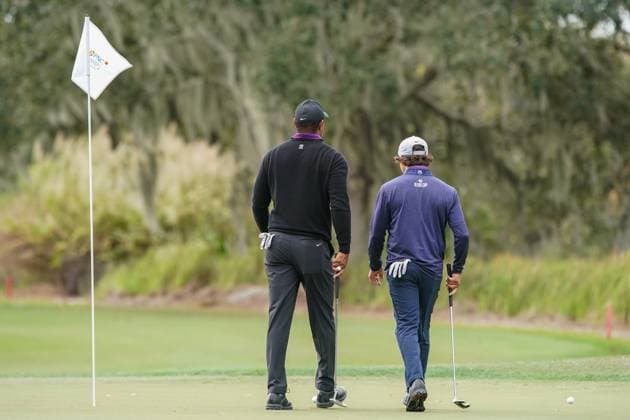 December 15, 2023, Orlando, Florida, USA: Tiger Woods (L) and Charlie Woods walk the 9th green during the 2023 PNC Championship Pro-Am at Ritz-Carlton Golf Club. Orlando USA - ZUMAw109 20231215_fap_w109_005 Copyright: xDebbyxWongx
