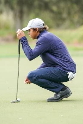 December 15, 2023, Orlando, Florida, USA: Charlie Woods lines up a putt on the 9th green during the 2023 PNC Championship Pro-Am at Ritz-Carlton Golf Club. Orlando USA - ZUMAw109 20231215_fap_w109_008 Copyright: xDebbyxWongx