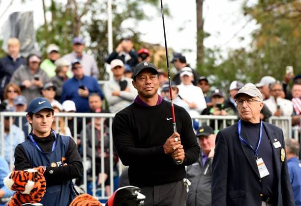 December 15, 2023, Orlando, Florida, United States: Tiger Woods prepares to tee off on the first hole of the Pro-Am at the PNC Championship golf tournament at the Ritz-Carlton Golf Club. Woods is playing in the tournament with his son, Charlie Woods. Orlando United States - ZUMAs197 20231215_aab_s197_060 Copyright: xPaulxHennessyx