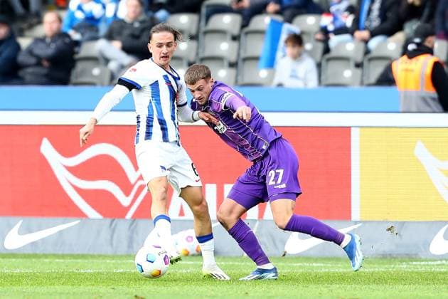 16.12.2023, xtgx, Fussball 2.Bundesliga, Hertha BSC Berlin - VfL Osnabrück emspor, v.l. Michal Karbownik (Hertha BSC Berlin) Michael Cuisance (VfL Osnabrueck Osnabrück) Zweikampf, Aktion, action, battle for the ball (DFL DFB REGULATIONS PROHIBIT ANY USE OF PHOTOGRAPHS as IMAGE SEQUENCES and or QUASI-VIDEO) Berlin