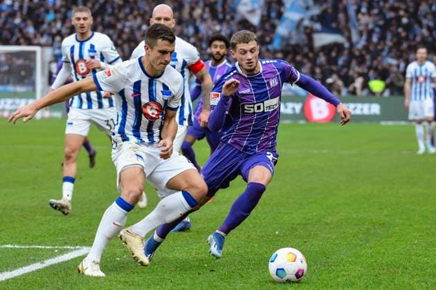 Fussball 2. Bundesliga, Hertha BSC - VfL Osnabrück 16.12.2023, xdanx, Fussball 2. Bundesliga, Hertha BSC - VfL Osnabrück, v.l. Marc Oliver Kempf (Hertha BSC 20),Michael Cuisance (VfL Osnabrück 27),Zweikampf, Duell, Kampf, tackle (DFL DFB REGULATIONS PROHIBIT ANY USE OF PHOTOGRAPHS as IMAGE SEQUENCES and or QUASI-VIDEO) Foto: Daniel Lakomski Mix1 Berlin Olympiastadion Berlin Berlin Deutschland (DE)