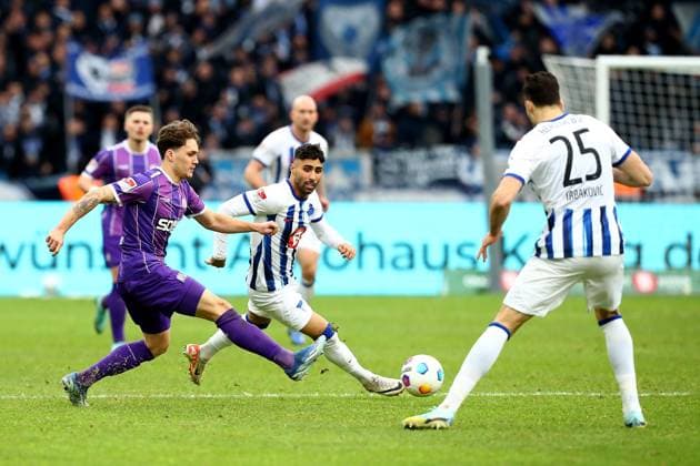 16.12.2023, xtgx, Fussball 2.Bundesliga, Hertha BSC Berlin - VfL Osnabrück emspor, v.l. Florian Kleinhansl (VfL Osnabrueck Osnabrück) Nader El-Jindaoui (Hertha BSC Berlin) Zweikampf, Aktion, action, battle for the ball (DFL DFB REGULATIONS PROHIBIT ANY USE OF PHOTOGRAPHS as IMAGE SEQUENCES and or QUASI-VIDEO) Berlin