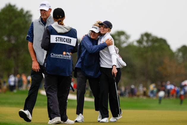 December 16, 2023: Izzy Stricker hugs her mom and caddie after Round One of the PNC Championship golf tournament at the Ritz-Carlton Golf Club in Orlando, Florida. CSM Orlando United States of America - ZUMAc04_ 20231216_zma_c04_119 Copyright: xDarrenxLeex