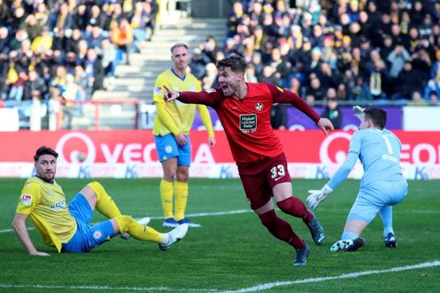 17.12.2023, xtgx, Fussball 2.Bundesliga, Eintracht Braunschweig - 1.FC Kaiserslautern emspor, v.l. Torjubel nach dem Eigentor zum celebrating the goal celebrate durch Ermin Bicakic (Eintracht Braunschweig) Jan Elvedi (1. FC Kaiserslautern) (DFL DFB REGULATIONS PROHIBIT ANY USE OF PHOTOGRAPHS as IMAGE SEQUENCES and or QUASI-VIDEO) Braunschweig