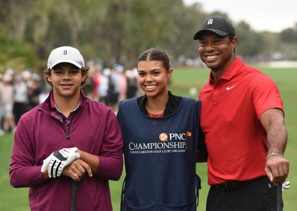 Final Round of PNC Championship in Orlando, Florida, US - 17 Dec 2023 Tiger Woods poses with his son, Charlie Woods, and his daughter, Sam Woods, before teeing off on the first hole during the final round of the PNC Championship at the Ritz-Carlton Golf Club in Orlando, Florida. Orlando United States Copyright: xPaulxHennessyx xSOPAxImagesx 12172023_PHH_PNC_08