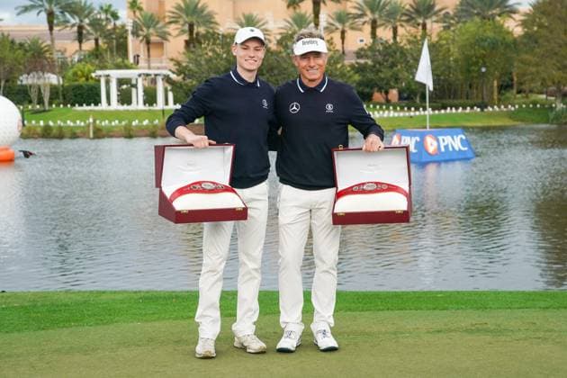 December 17, 2023, Orlando, Florida, USA: Bernhard Langer (R) and son, Jason, hold the Willie Park trophies after winning the final round of the 2023 PNC Championship at Ritz-Carlton Golf Club. Orlando USA - ZUMAw109 20231217_fap_w109_044 Copyright: xDebbyxWongx