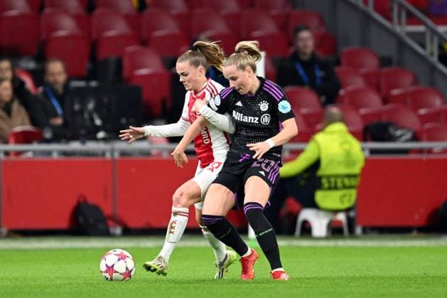 AMSTERDAM - (l-r) Milicia Keijzer of Ajax, Franziska Kett of FC Bayern Munchen during the UEFA women s Champions League group C match between Ajax Amsterdam and FC Bayern Munchen at the Johan Cruijff ArenA on December 20, 2023 in Amsterdam, Netherlands. ANP UEFA Women s Champions League 2023 24 2023 2024 xVIxANPxSportx xxANPxIVx 486785684 originalFilename: 486785684.jpg