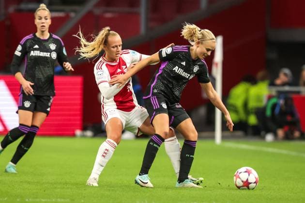 AMSTERDAM, 20-12-2023 ,Johan Cruijff Arena, UEFA Womens Champions League, Ajax - Bayern Munchen (women) , season 2022 2023, during the match Ajax - Bayern Munchen (women), Ajax player Tiny Hoekstra, Bayern Munchen player Pernille Harder Ajax - Bayern Munchen (women)  x23597606x Copyright: