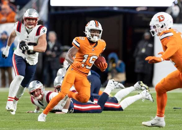 December 24, 2023, Denver, Colorado, USA: Broncos MARVIN MIMS JR. runs for big yardage following a kick return in the 2nd. Half Sunday night at Empower Field at Mile High in Denver, CO. The Patriots beat the Broncos 26-23. Denver USA - ZUMAav4_ 20231224_zaf_av4_002 Copyright: xHectorxAcevedox