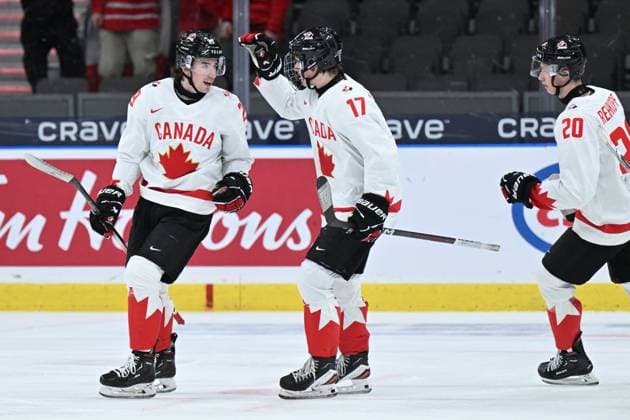 GOTHENBURG, SWEDEN 20231227 Canada s 29 Brayden Yager celebrates after scoring 0-2 with team mates Macklin Celbrini and Carson Rehkopf during the IIHF World Junior Championship group A Ice hockey, Eishockey match between Latvia and Canada at Scandinavium in Gothenburg, Sweden December 27, 2023. GOTHENBURG SWEDEN x9200x