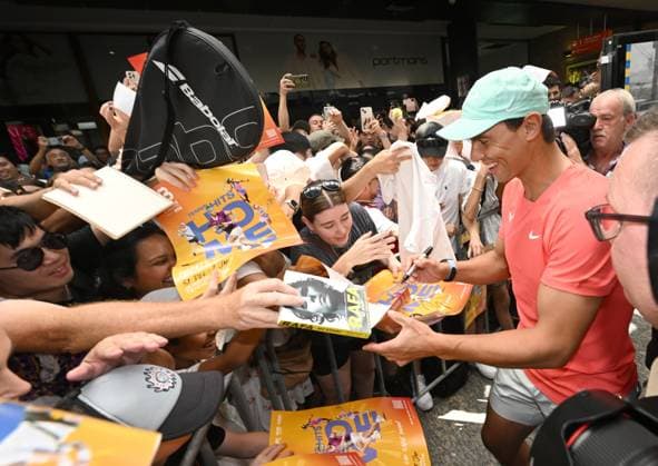 TENNIS RAFAEL NADAL BRISBANE INTERNATIONAL, Rafael Nadal (right) of Spain is seen with fans in the Queen Street Mall in Brisbane, Friday, December 29, 2023. Rafael Nadal will be playing in the Brisbane International tennis tournament after taking a long break from tennis due to an injury.( NO ARCHIVING, EDITORIAL USE ONLY, NO USE IN BOOKS WITHOUT CONSENT BRISBANE QUEENSLAND AUSTRALIA  Copyright: xDARRENxENGLANDx 20231229001882817322