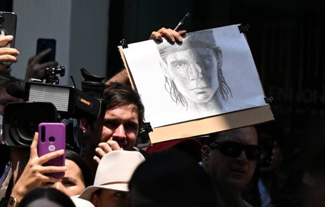 TENNIS RAFAEL NADAL BRISBANE INTERNATIONAL, A fan is seen with a drawing of Rafael Nadal of Spain in the Queen Street Mall in Brisbane, Friday, December 29, 2023. Rafael Nadal will be playing in the Brisbane International tennis tournament after taking a long break from tennis due to an injury.( NO ARCHIVING, EDITORIAL USE ONLY, NO USE IN BOOKS WITHOUT CONSENT BRISBANE QUEENSLAND AUSTRALIA  Copyright: xDARRENxENGLANDx 20231229001882826465